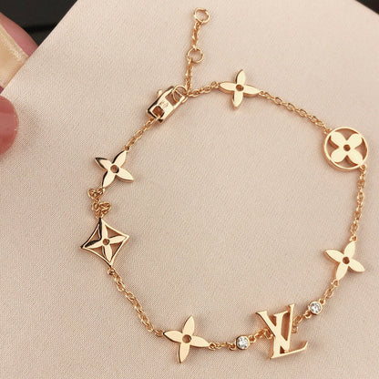 [BLUE TEARS]STAR AND SUN 7 MOTIFS GOLD BRACELET