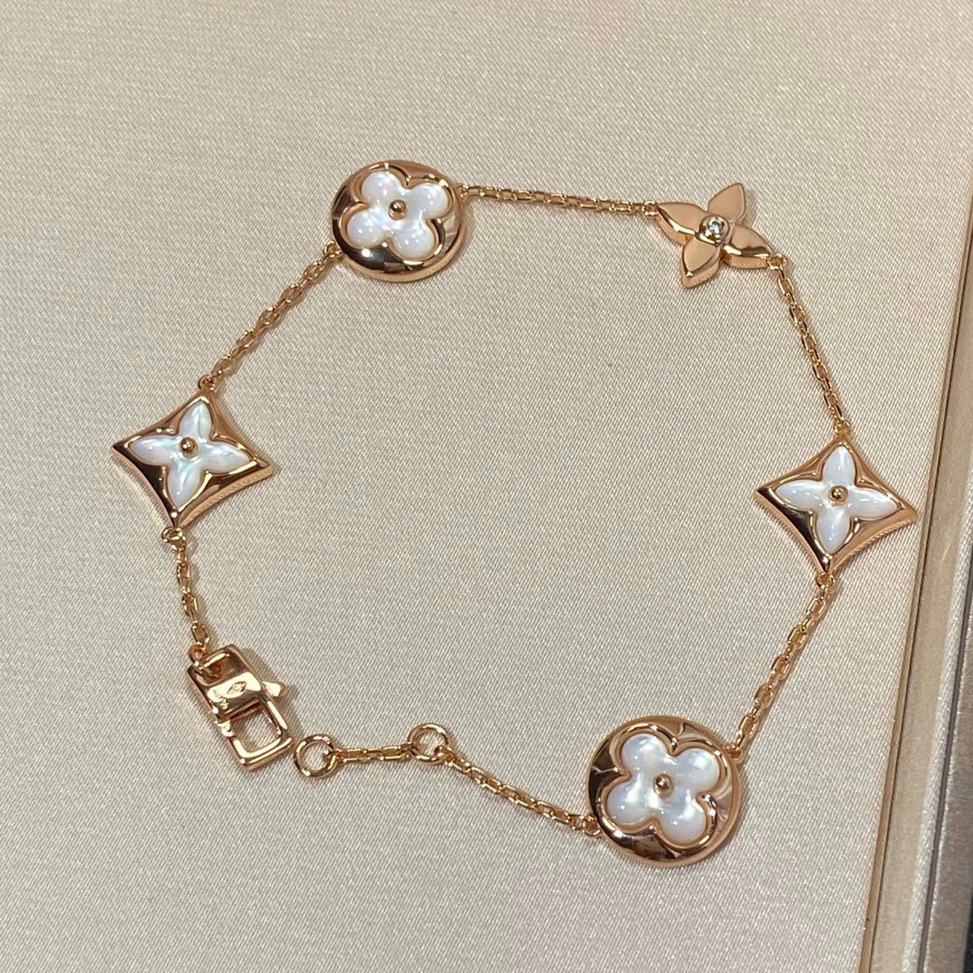 [BLUE TEARS]STAR AND SUN 5 MOTIF MOP PINK GOLD BRACELET